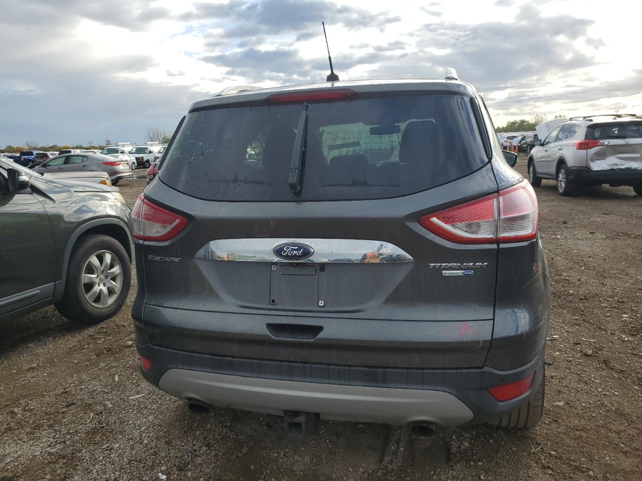 2015 Ford Escape Titanium VIN: 1FMCU9J98FUB16983 Lot: 89482625