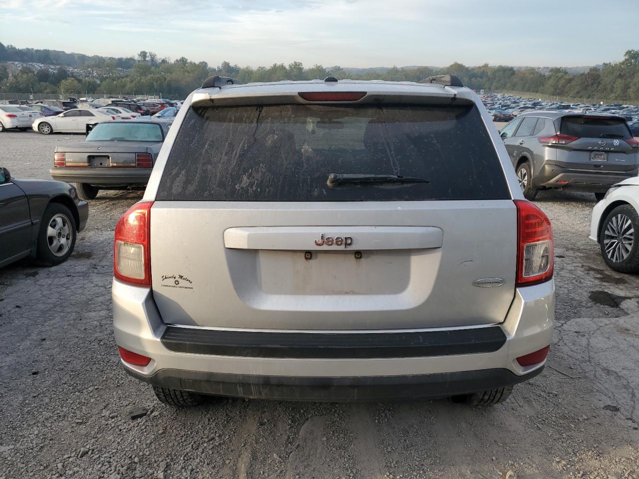 2011 Jeep Compass Sport VIN: 1J4NT1FA7BD267483 Lot: 85316875