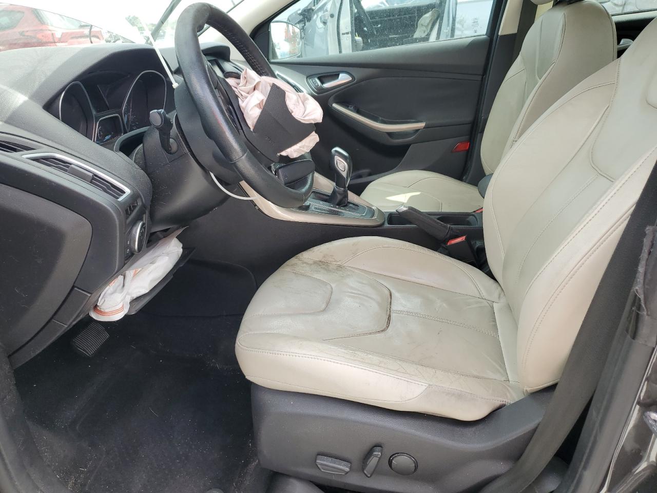 2015 Ford Focus Titanium VIN: 1FADP3J27FL322047 Lot: 82182475