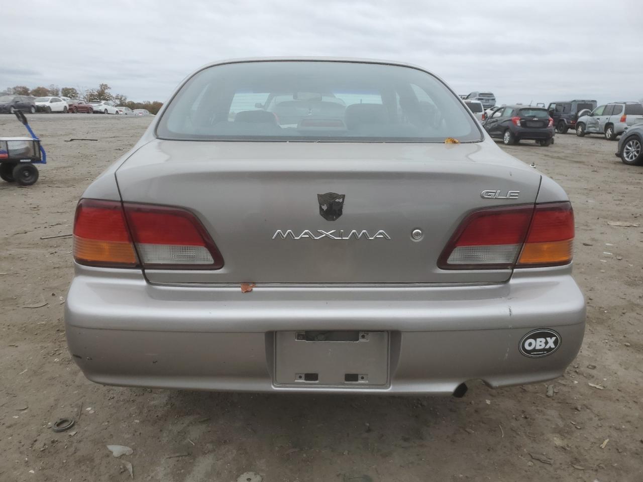 1999 Nissan Maxima Gle VIN: JN1CA21D5XT203467 Lot: 90709715