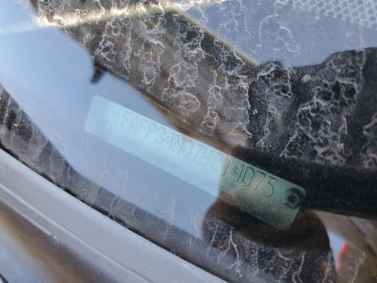 2007 Ford Focus Zx4 VIN: 1FAFP34N07W214075 Lot: 82256635