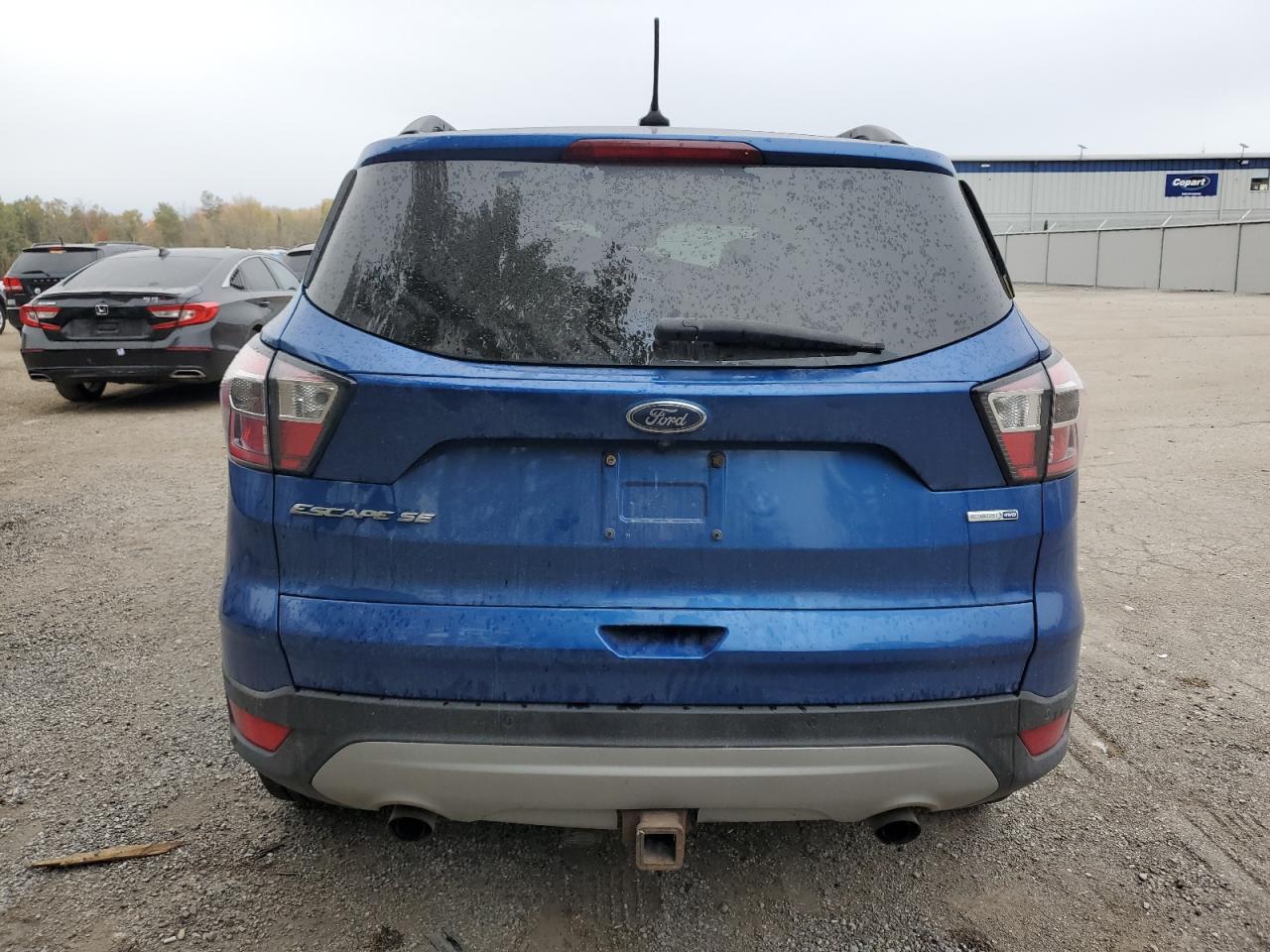 2018 Ford Escape Se VIN: 1FMCU9GD7JUA05961 Lot: 82458805