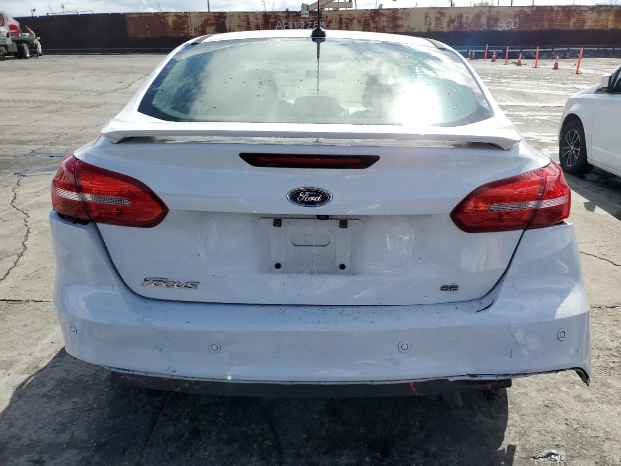 2016 Ford Focus Se VIN: 1FADP3F21GL227302 Lot: 86270835