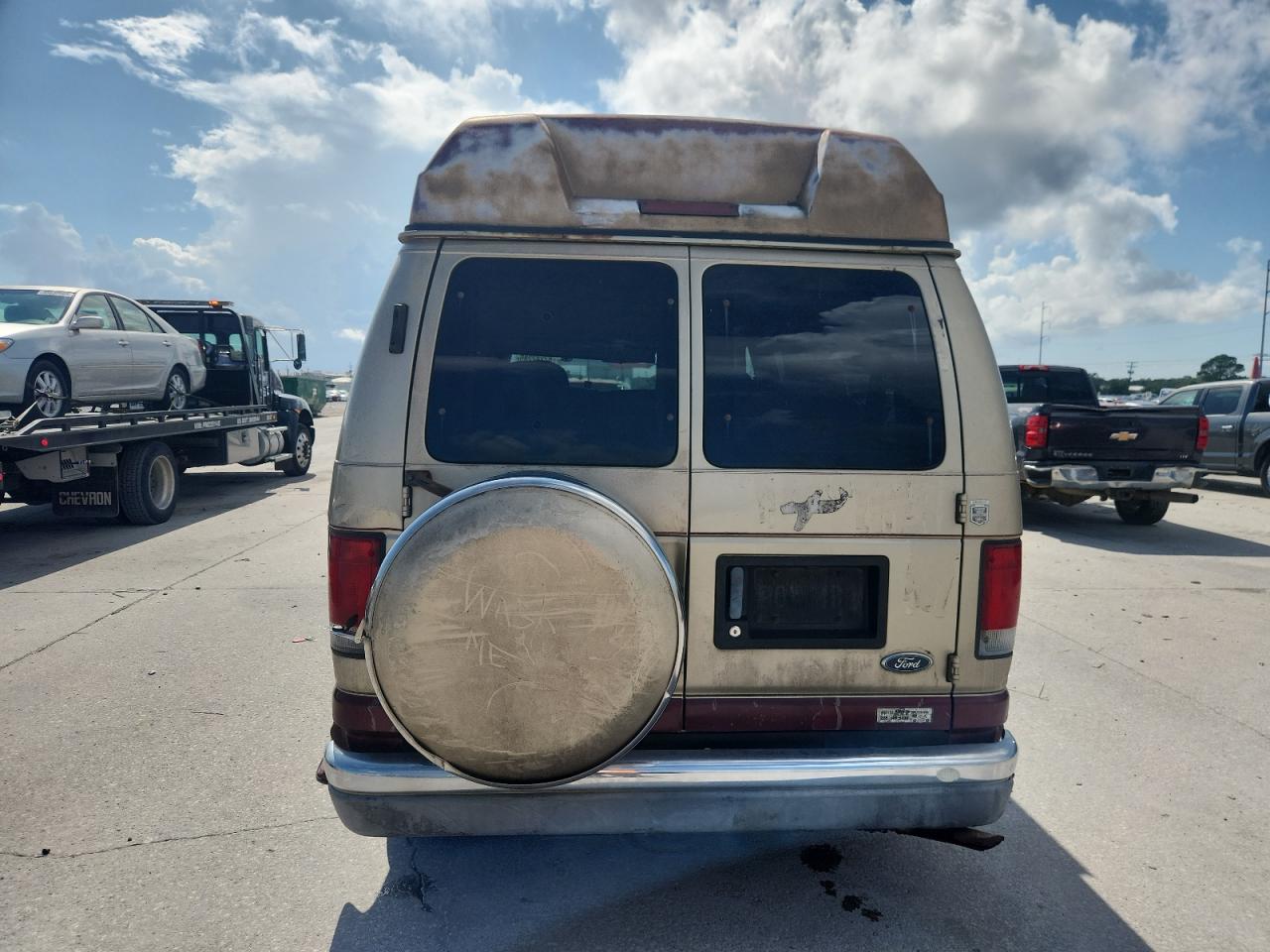 1999 Ford Econoline E150 Van VIN: 1FDRE14LXXHB69162 Lot: 82242285