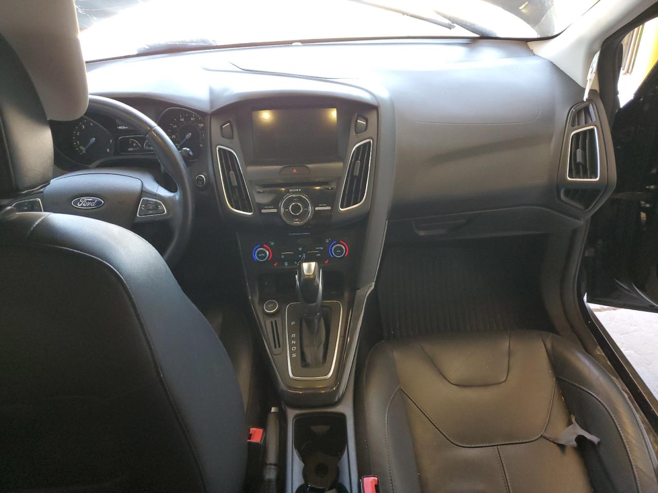 2016 Ford Focus Titanium VIN: 1FADP3N2XGL225310 Lot: 82356935