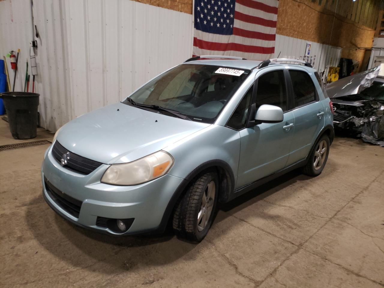 SUZUKI SX4 2009. Lot# 89897745. VIN JS2YB417196201437. Photo 1