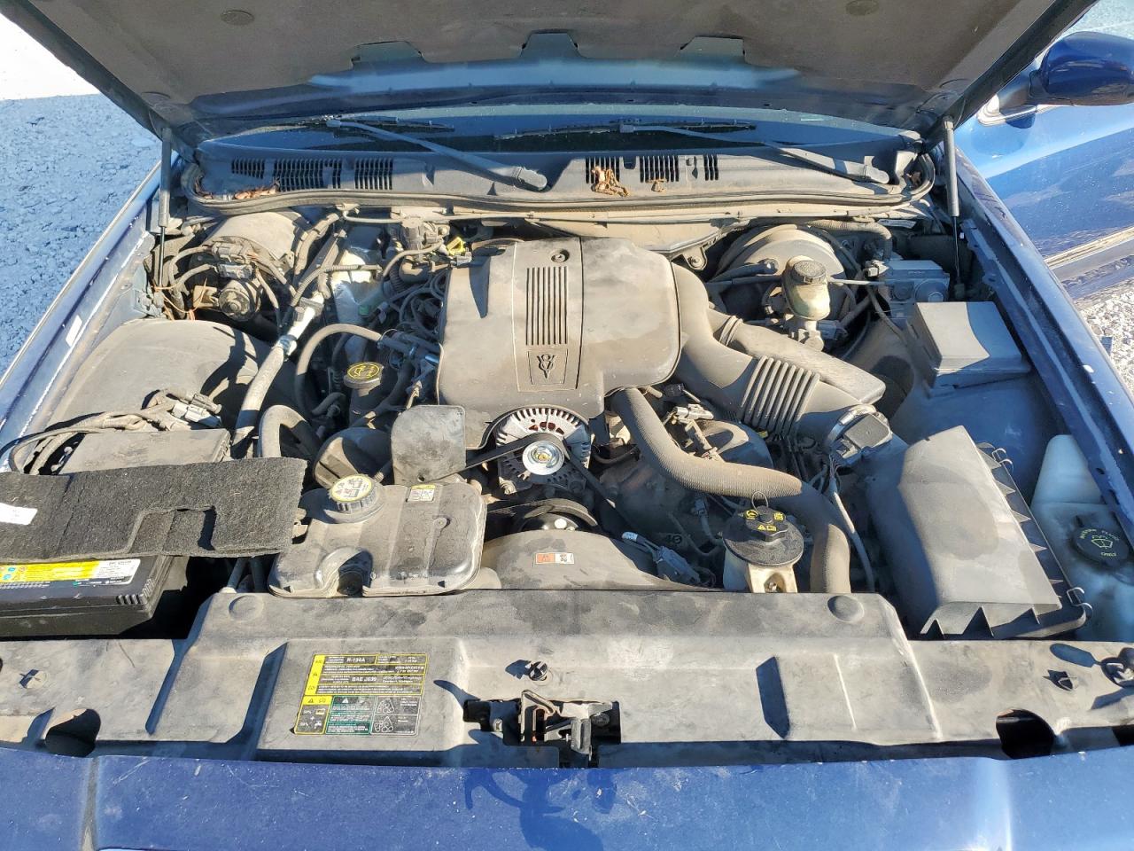 2004 Mercury Grand Marquis Gs VIN: 2MEFM74W24X666899 Lot: 86067405