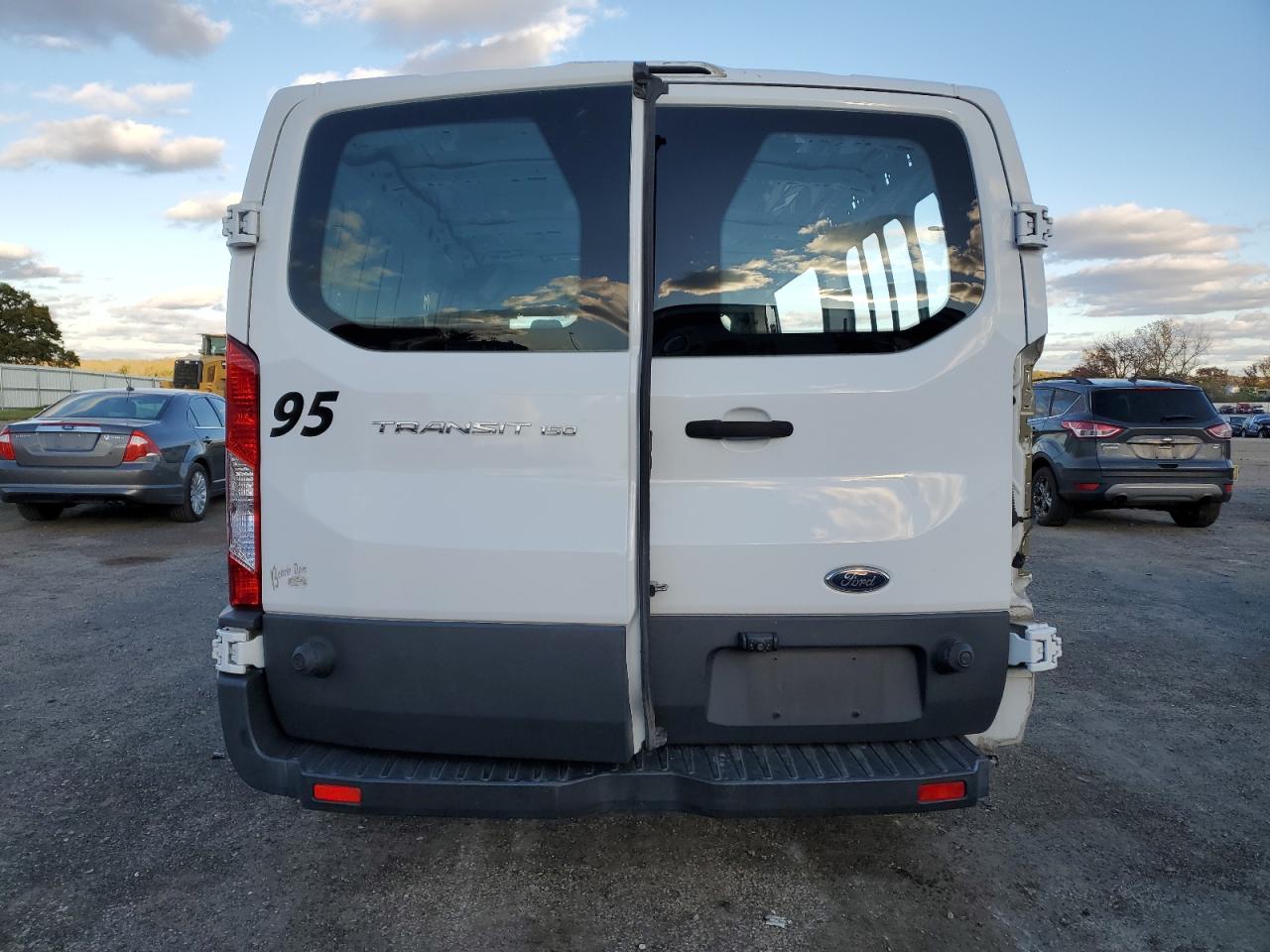 2015 Ford Transit 150 Delivery Van VIN: 1FTNE2YM0FKA52459 Lot: 89633395