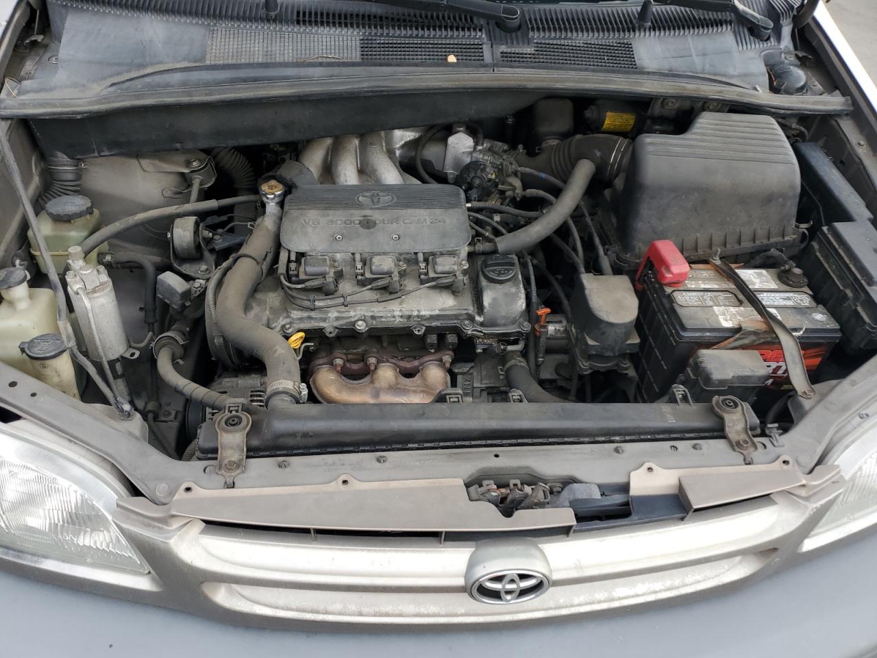 1999 Toyota Sienna Le VIN: 4T3ZF13C9XU139566 Lot: 86892295