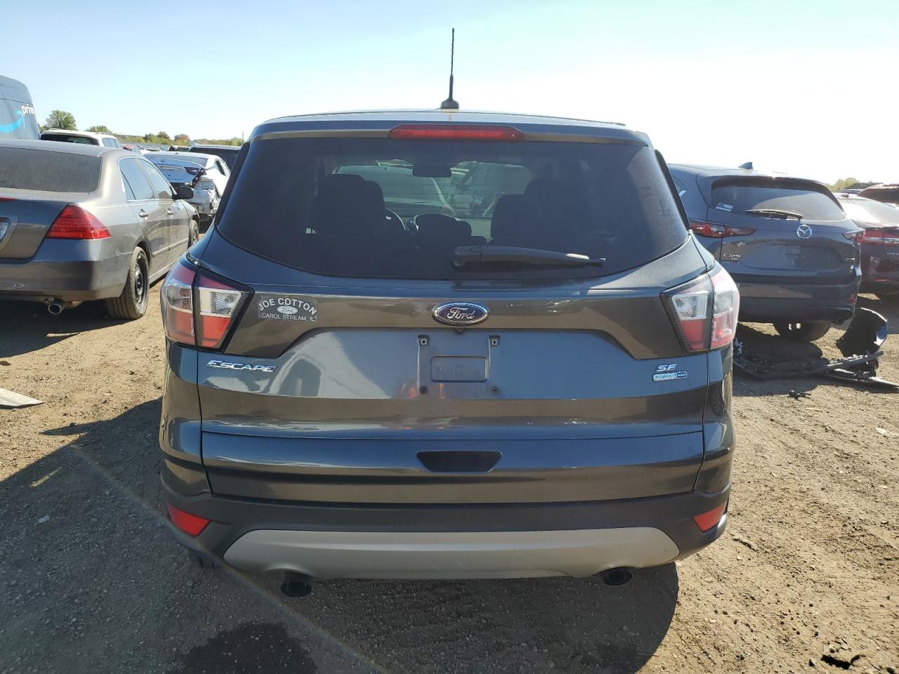 2017 Ford Escape Se VIN: 1FMCU9GD1HUD49859 Lot: 81989145