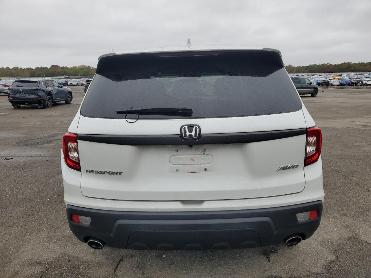 2021 Honda Passport Exl VIN: 5FNYF8H53MB042377 Lot: 90366425