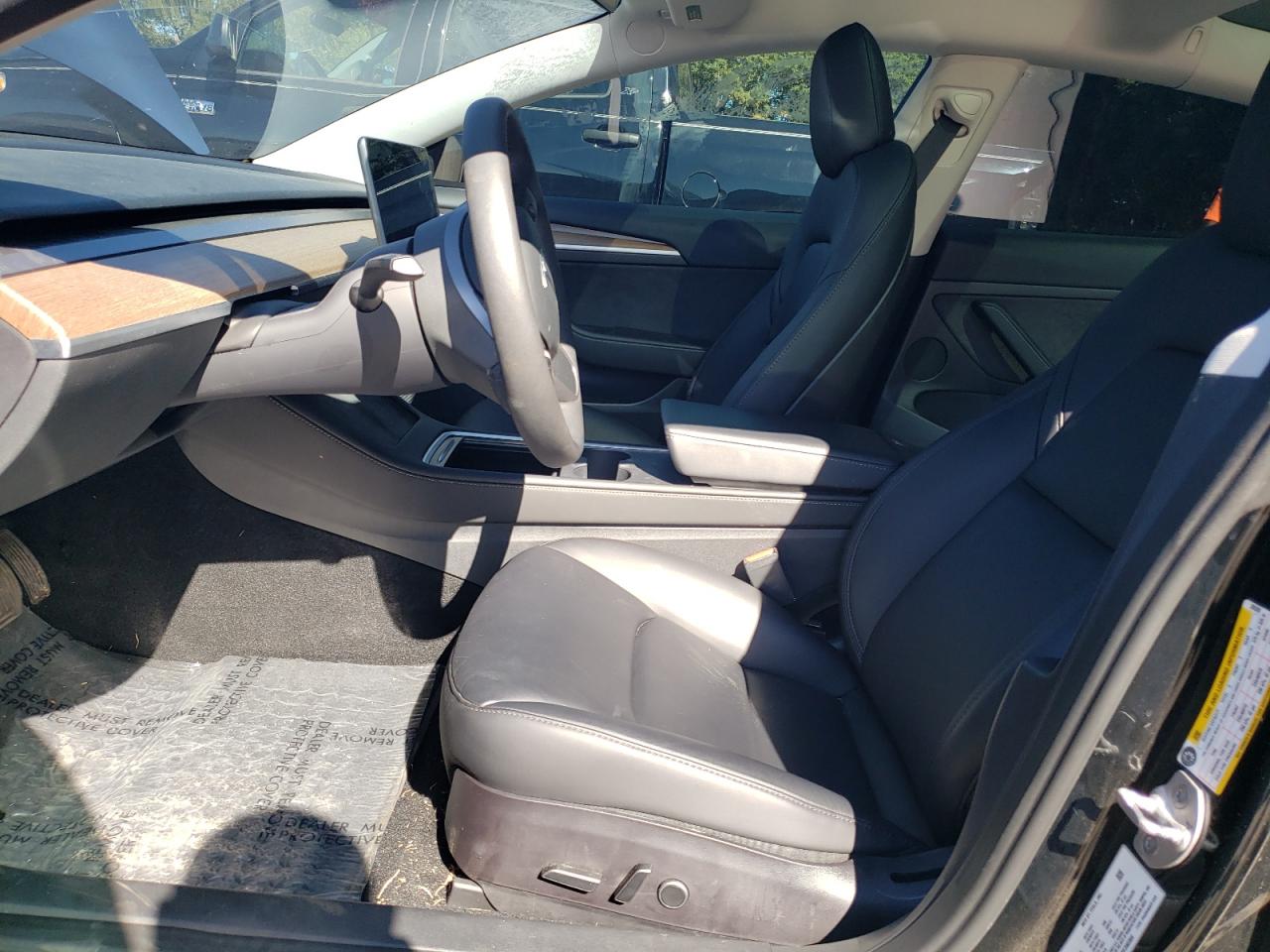 2023 Tesla Model 3 VIN: 5YJ3E1EB1PF390388 Lot: 86601385