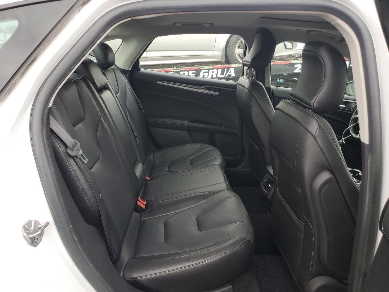 2016 Ford Fusion Titanium Phev VIN: 3FA6P0SU8GR194217 Lot: 82210555