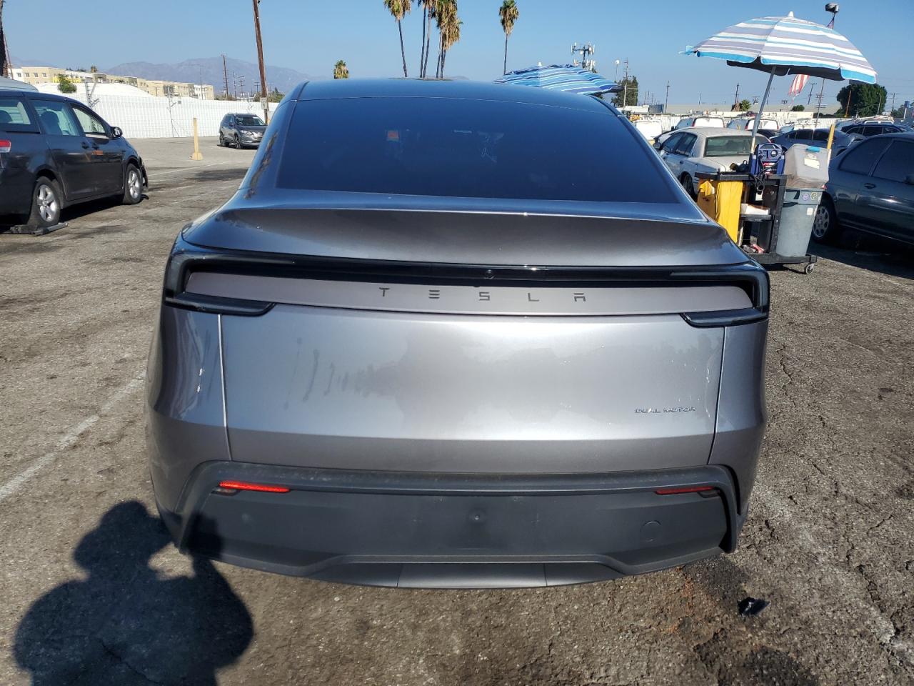 2026 Tesla Model Y VIN: 7SAYGDEE9TF373296 Lot: 85136175