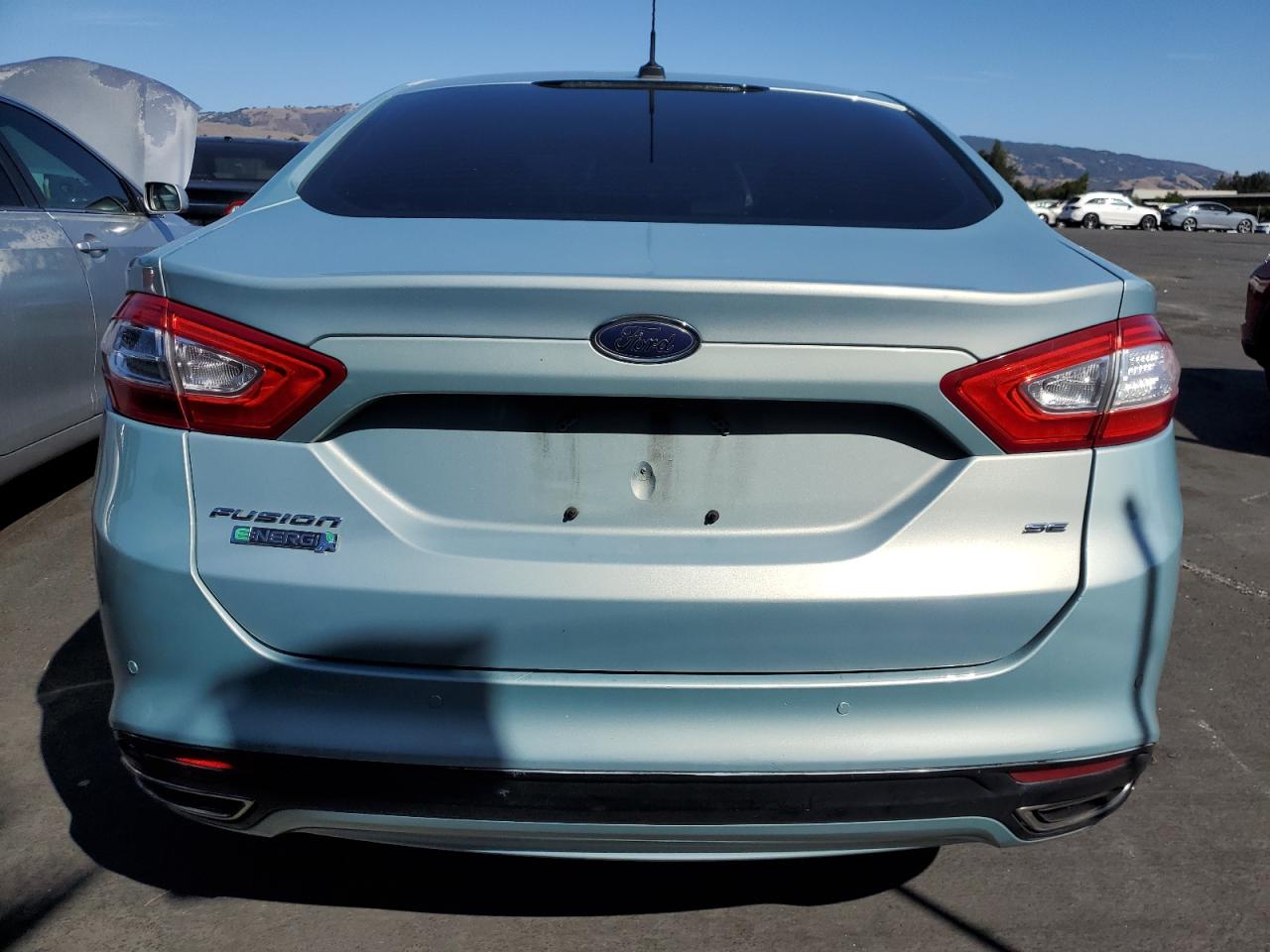 2014 Ford Fusion Se Phev VIN: 3FA6P0PU7ER299451 Lot: 86095445