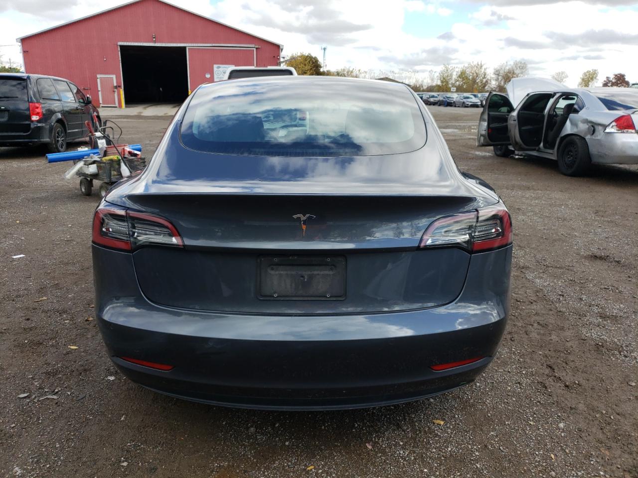 2021 Tesla Model 3 VIN: 5YJ3E1EA0MF052855 Lot: 87210175
