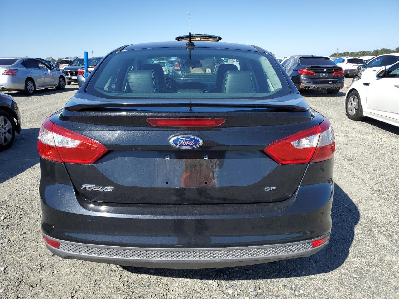 2014 Ford Focus Se VIN: 1FADP3F23EL433413 Lot: 82184055