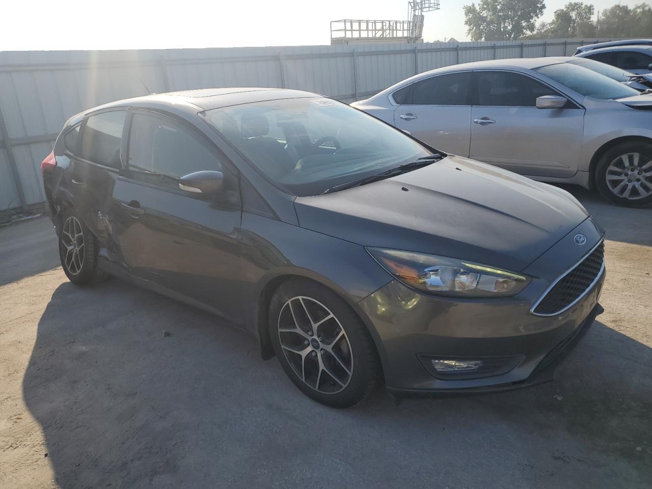 2017 Ford Focus Sel VIN: 1FADP3M26HL244990 Lot: 84960555