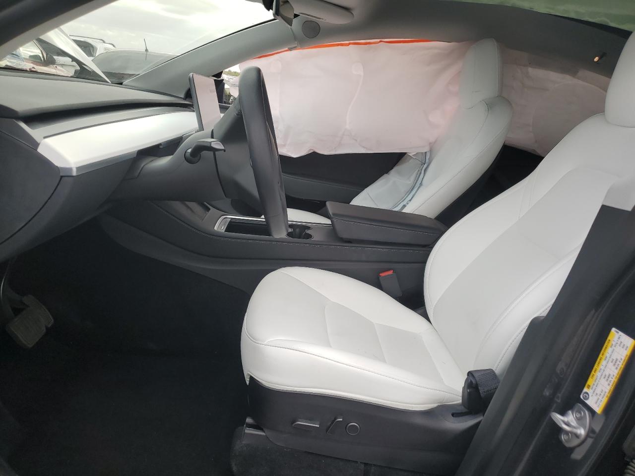 2023 Tesla Model Y VIN: 7SAYGDEE4PF618690 Lot: 82493595