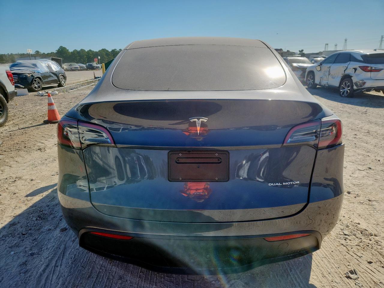 2023 Tesla Model Y VIN: 7SAYGDEE3PF876599 Lot: 82397215