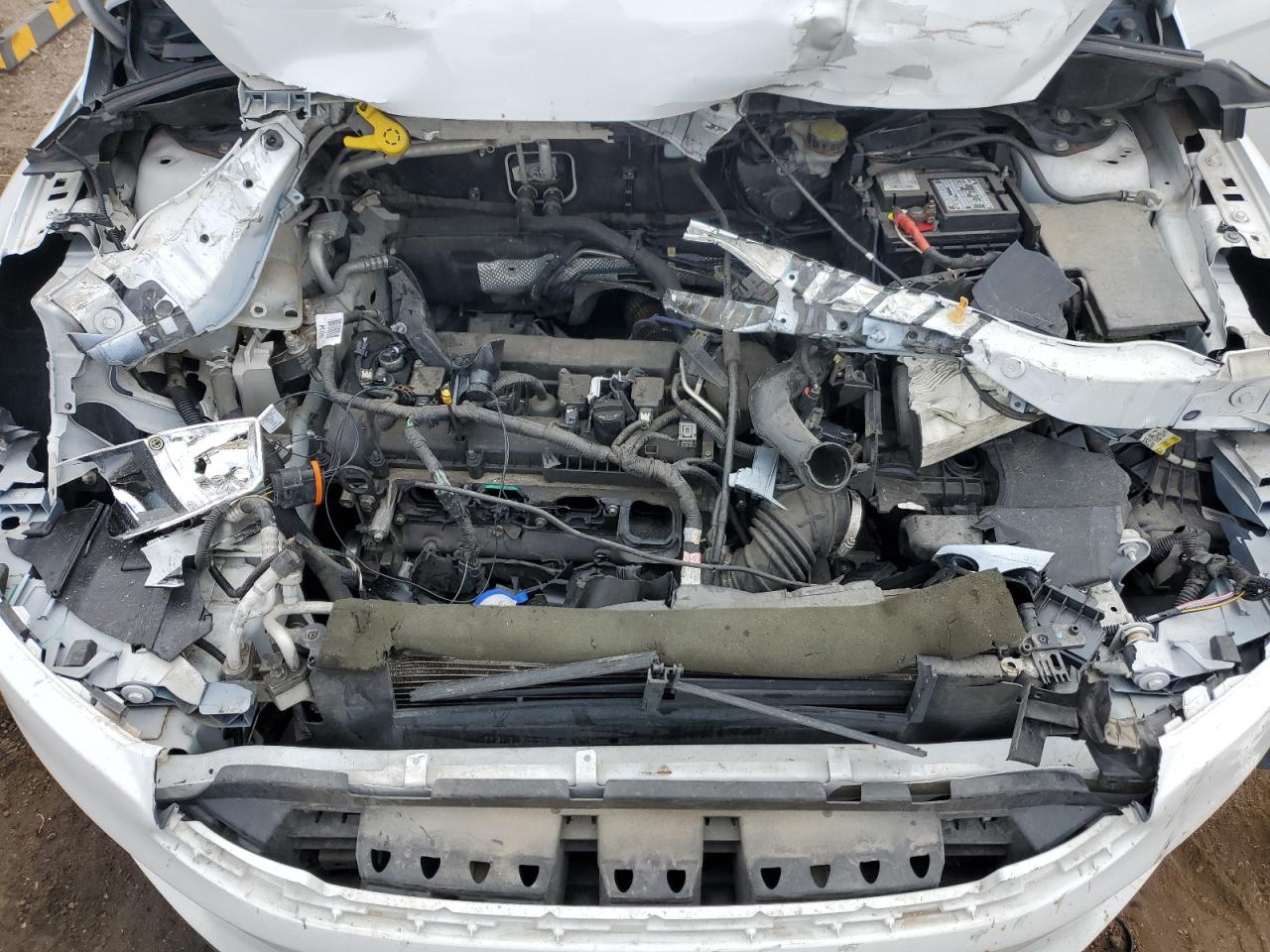 2015 Ford Focus S VIN: 1FADP3E24FL221235 Lot: 82374575