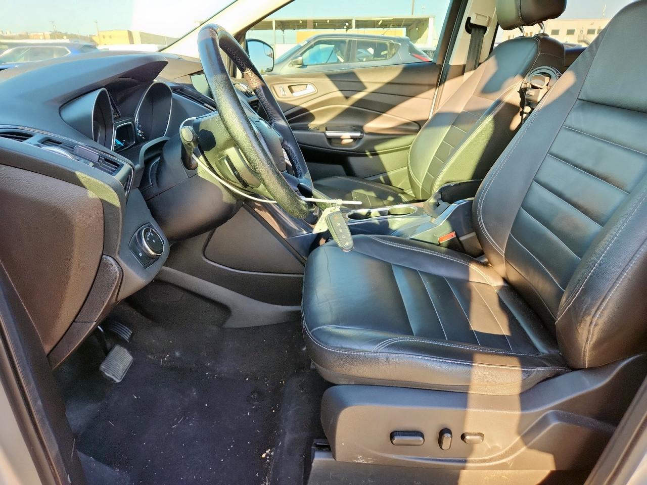 2014 Ford Escape Titanium VIN: 1FMCU0J90EUA37737 Lot: 82308555