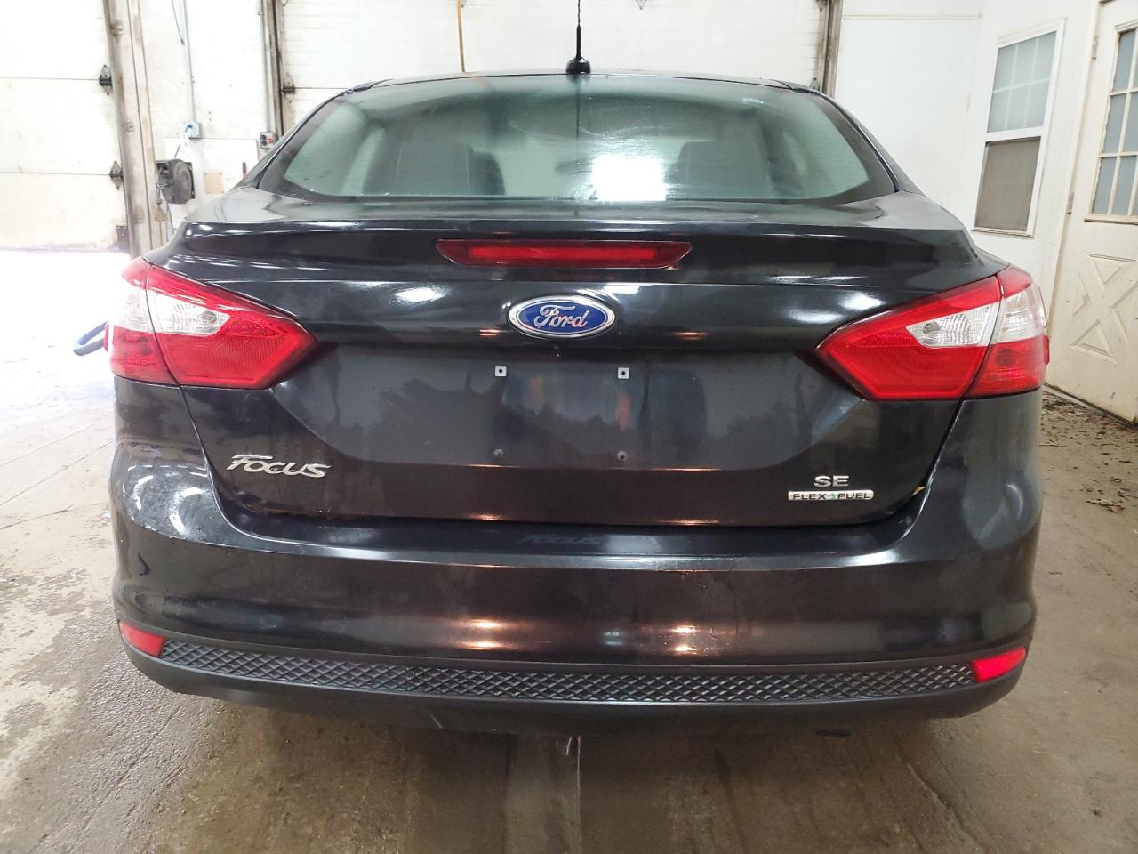 2014 Ford Focus Se VIN: 1FADP3F20EL129343 Lot: 85750105