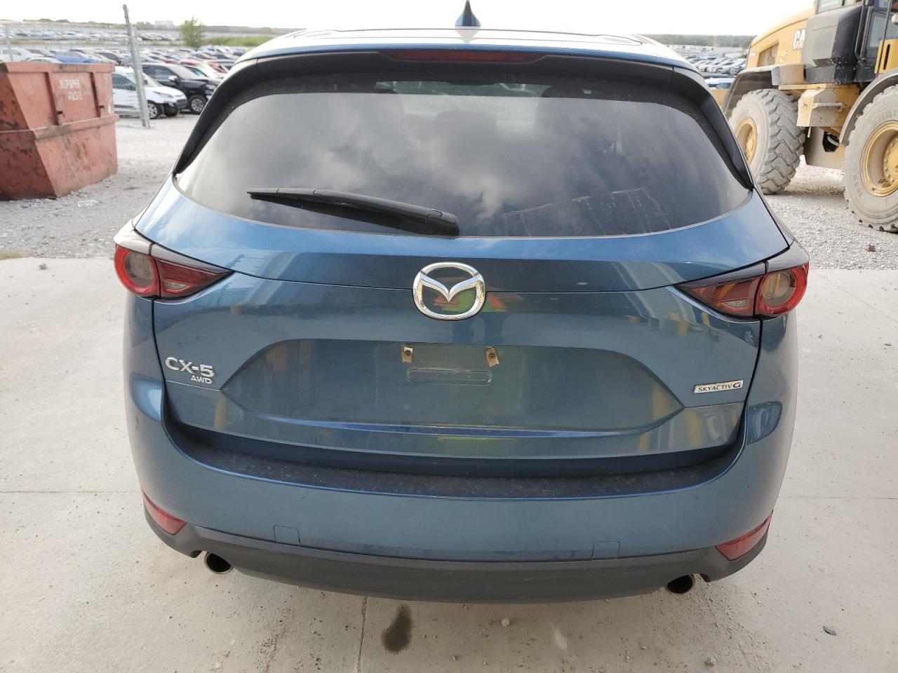 2021 Mazda Cx-5 Touring VIN: JM3KFBCM8M1370668 Lot: 81922665