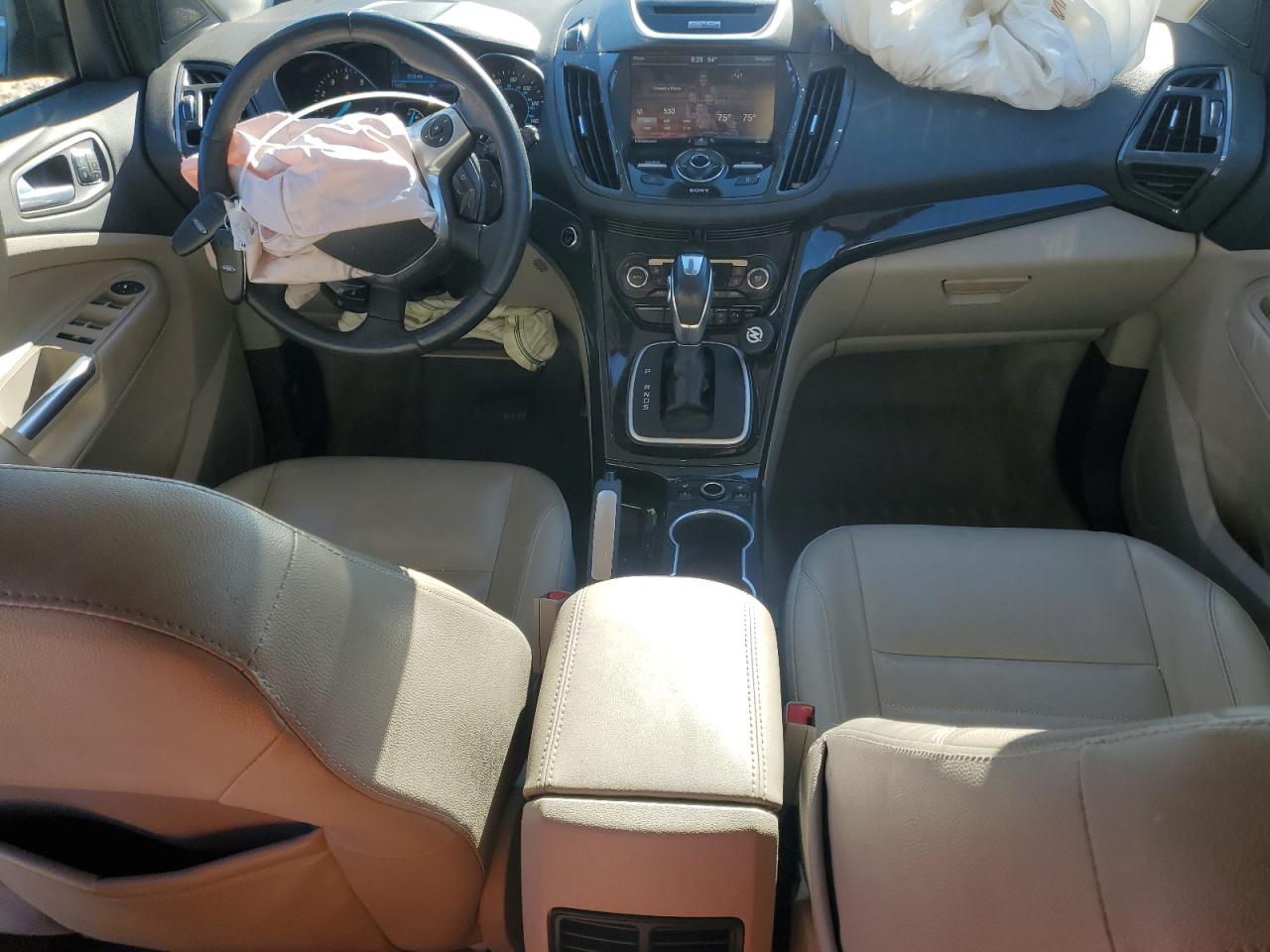 2014 Ford Escape Titanium VIN: 1FMCU0J95EUB81879 Lot: 82444345