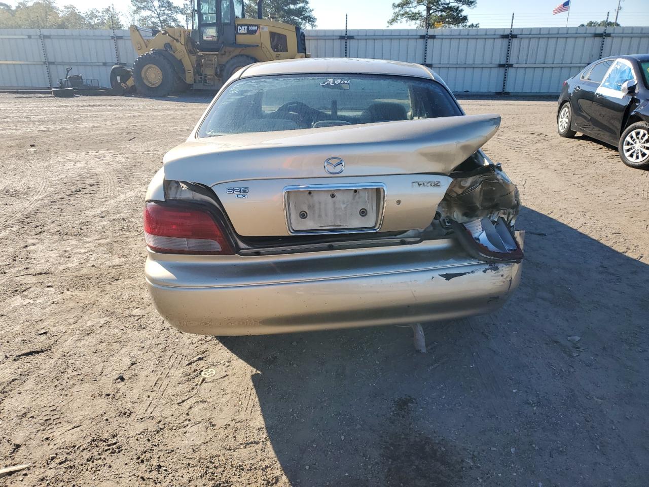 1999 Mazda 626 Es VIN: 1YVGF22C7X5885434 Lot: 90733295