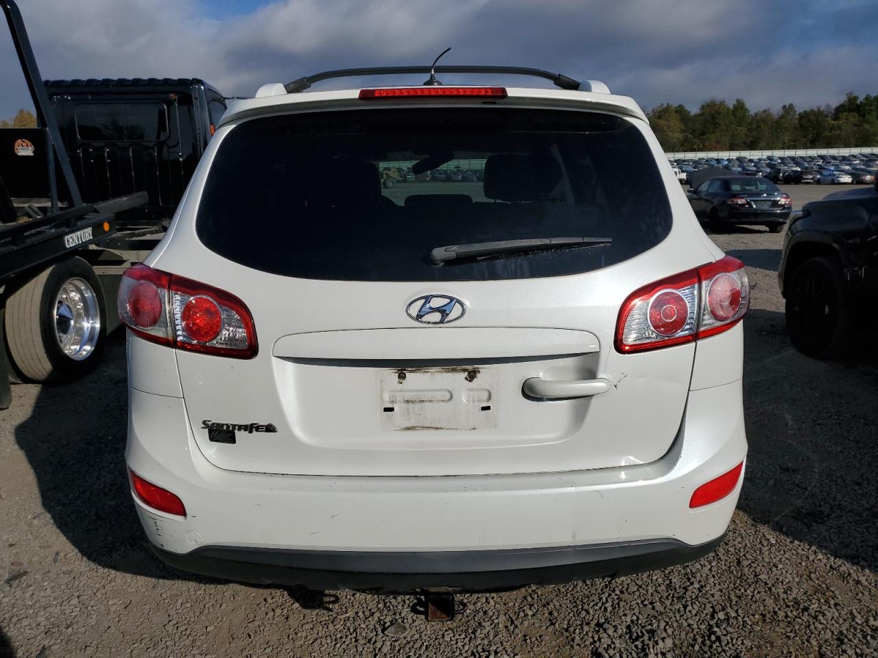 2012 Hyundai Santa Fe Se VIN: 5XYZH4AG7CG097957 Lot: 85482895
