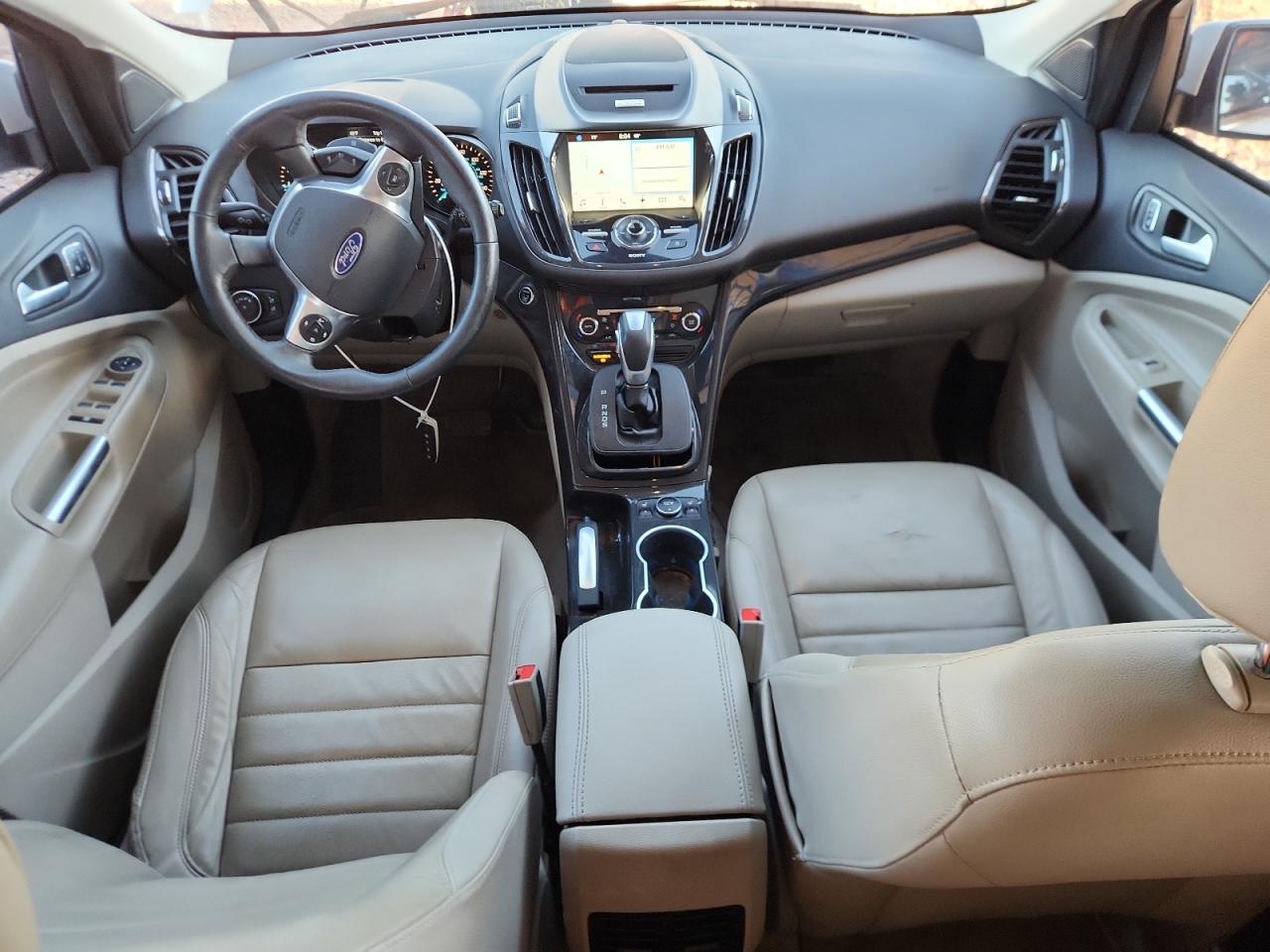 2016 Ford Escape Titanium VIN: 1FMCU0J96GUC80651 Lot: 82005795