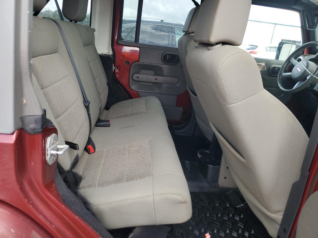 2009 Jeep Wrangler Unlimited Sahara VIN: 1J4GA59199L771647 Lot: 84899905