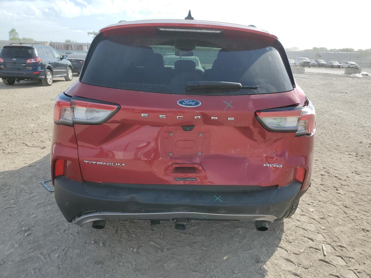 2021 Ford Escape Titanium VIN: 1FMCU9J96MUA10559 Lot: 85286925