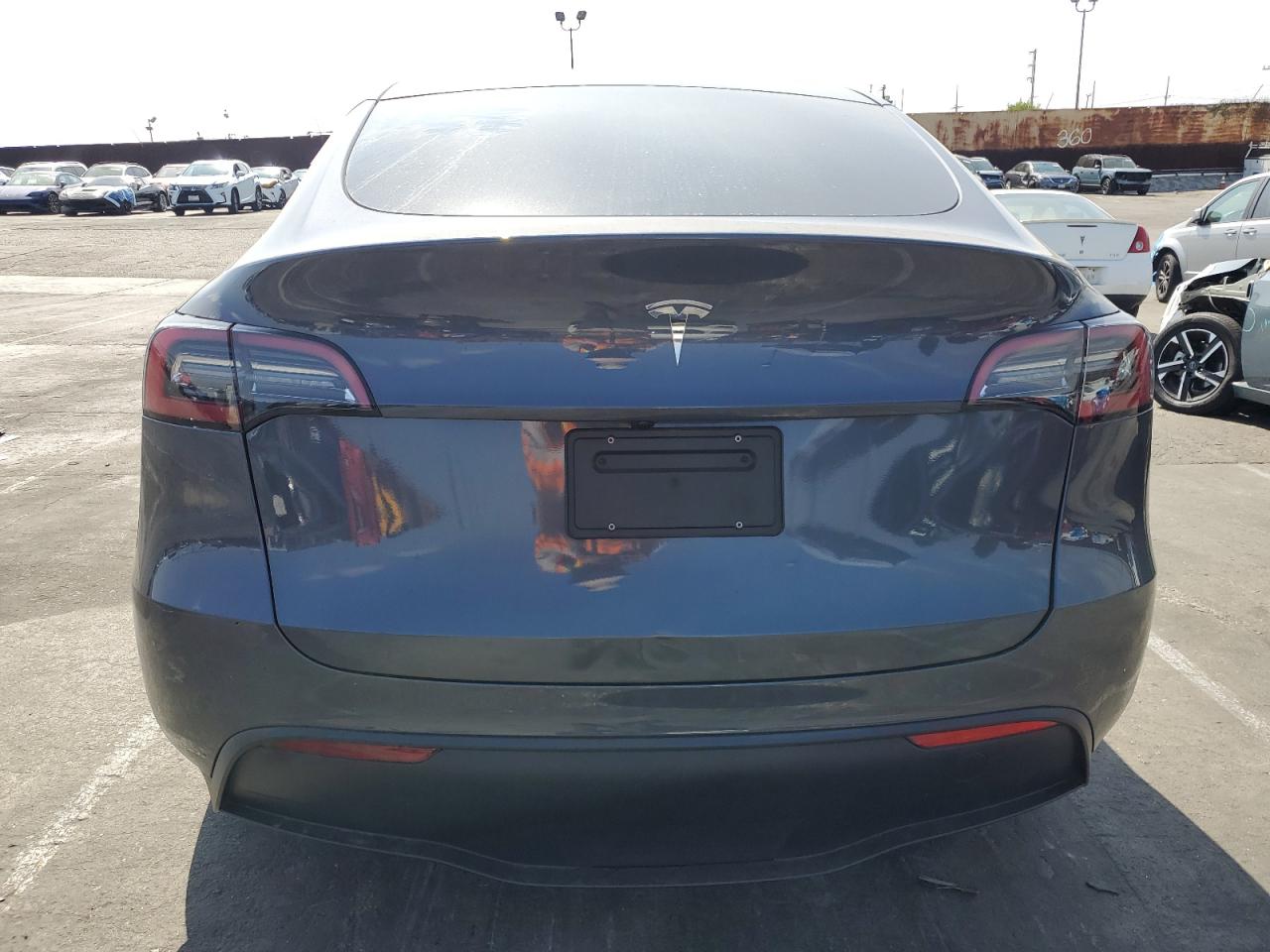 2023 Tesla Model Y VIN: 7SAYGDED8PF971831 Lot: 82273565