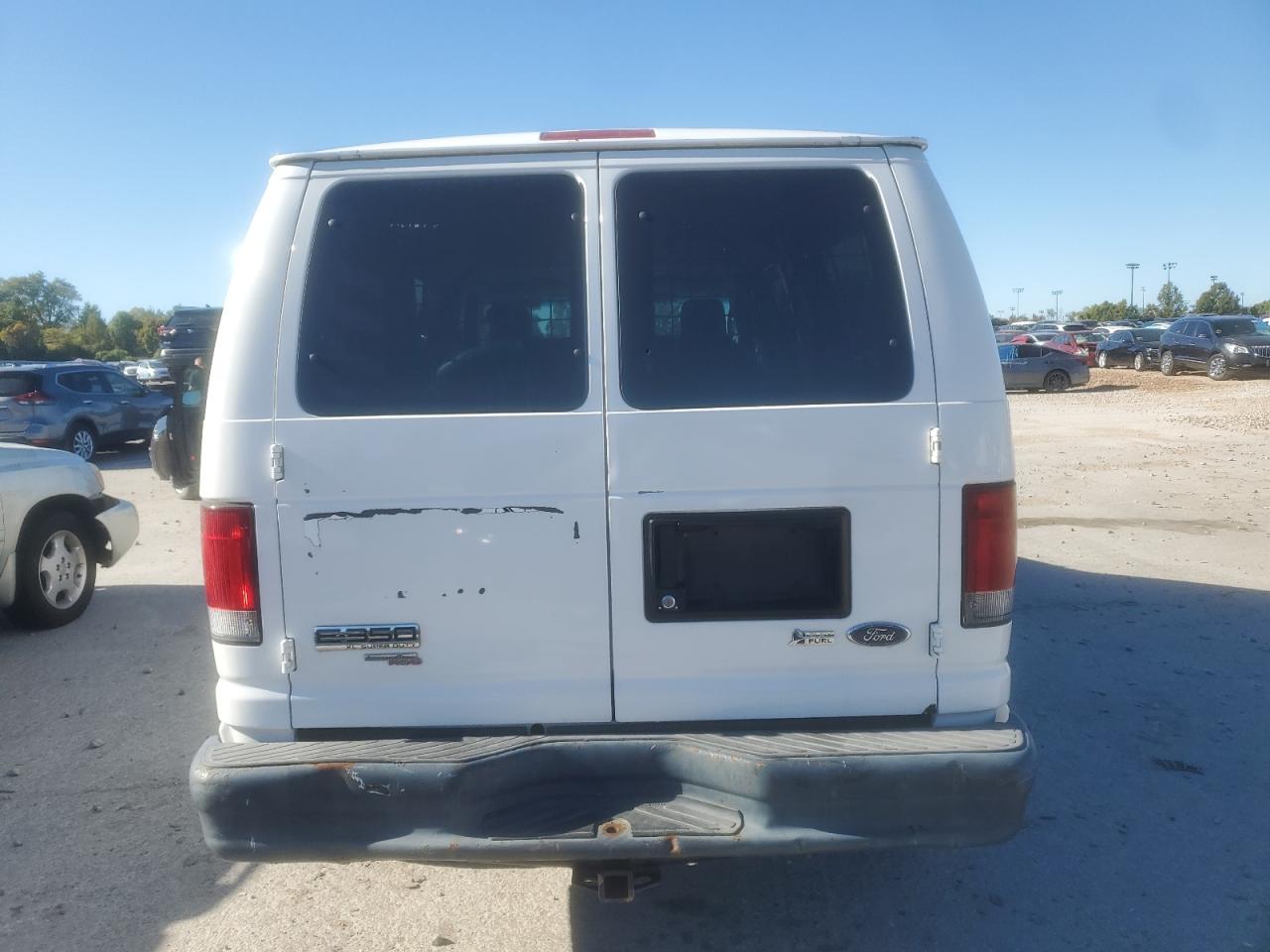 2009 Ford Econoline E350 Super Duty Wagon VIN: 1FBNE31L29DA49907 Lot: 89527665