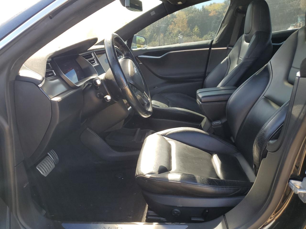 2014 Tesla Model S VIN: 5YJSA1H28EFP63717 Lot: 82633905