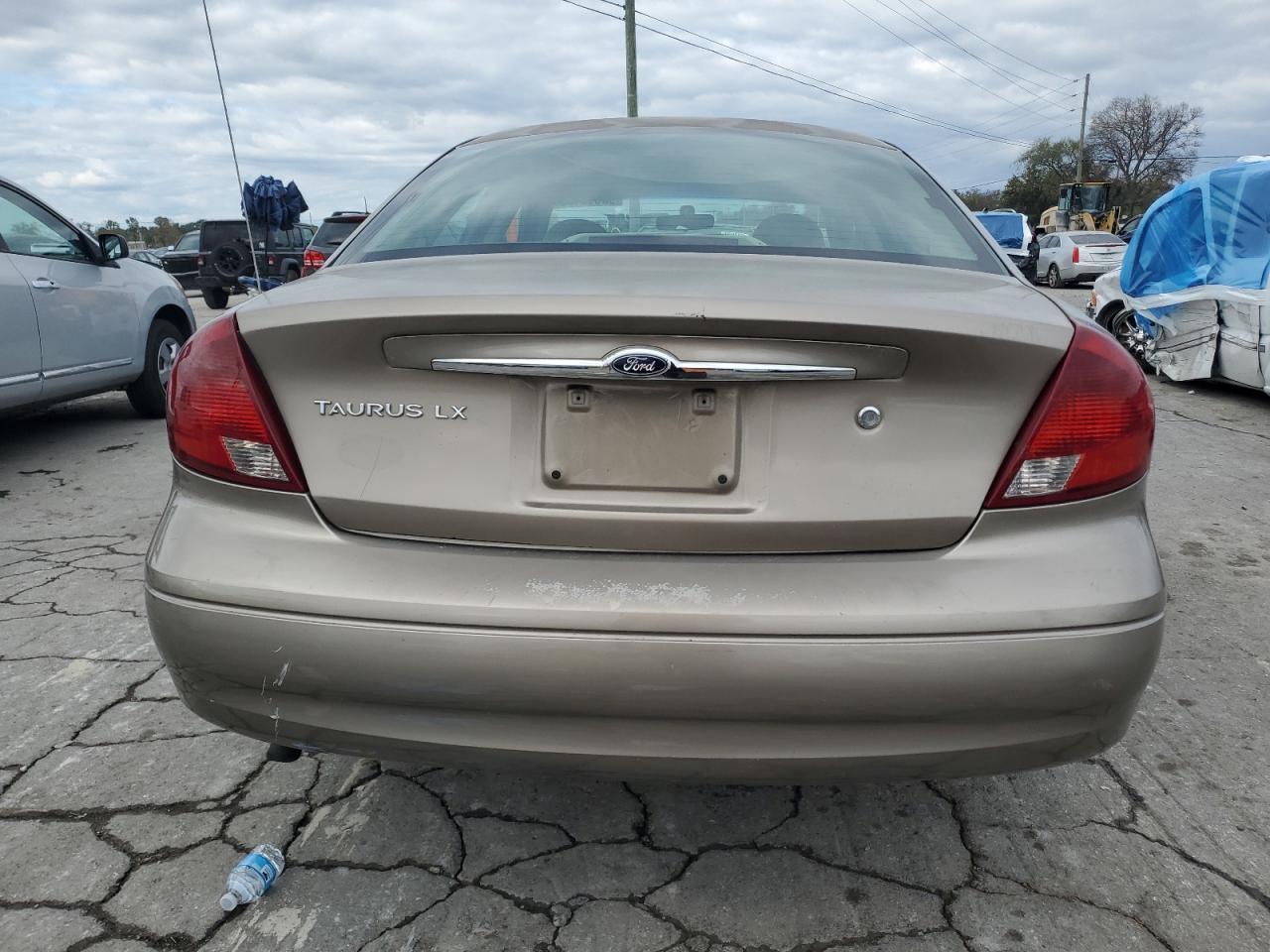 2002 Ford Taurus Lx VIN: 1FAFP52UX2A123942 Lot: 90810195