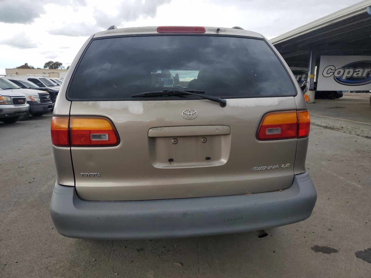 1999 Toyota Sienna Le VIN: 4T3ZF13C9XU139566 Lot: 86892295