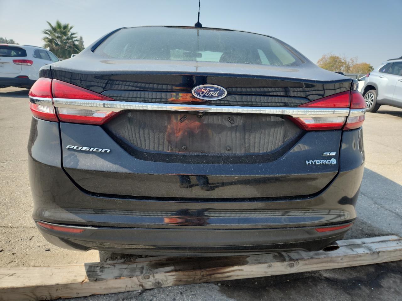 2017 Ford Fusion Se Hybrid VIN: 3FA6P0LU8HR374815 Lot: 82540255