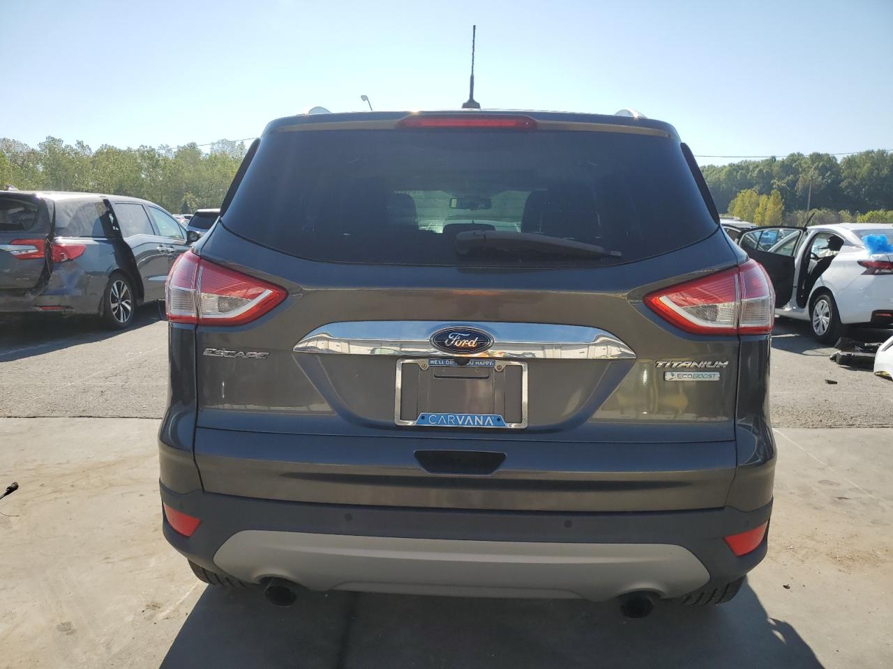 2016 Ford Escape Titanium VIN: 1FMCU0JX0GUA07493 Lot: 84804645