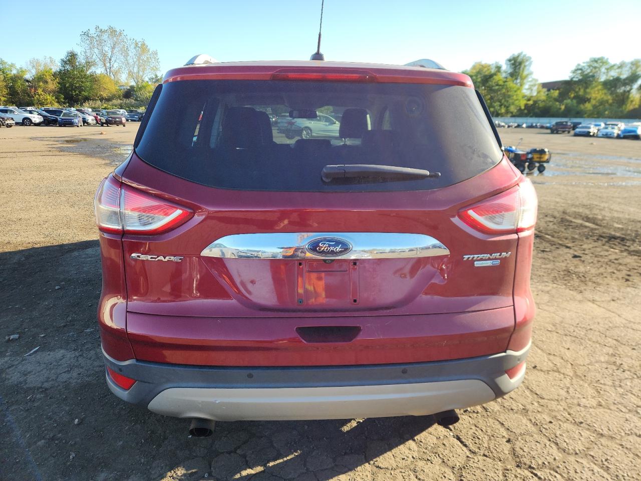 2016 Ford Escape Titanium VIN: 1FMCU9JXXGUC16857 Lot: 85663975