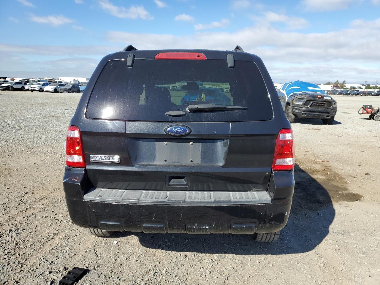 2011 Ford Escape Xlt VIN: 1FMCU0D73BKB73099 Lot: 81999675