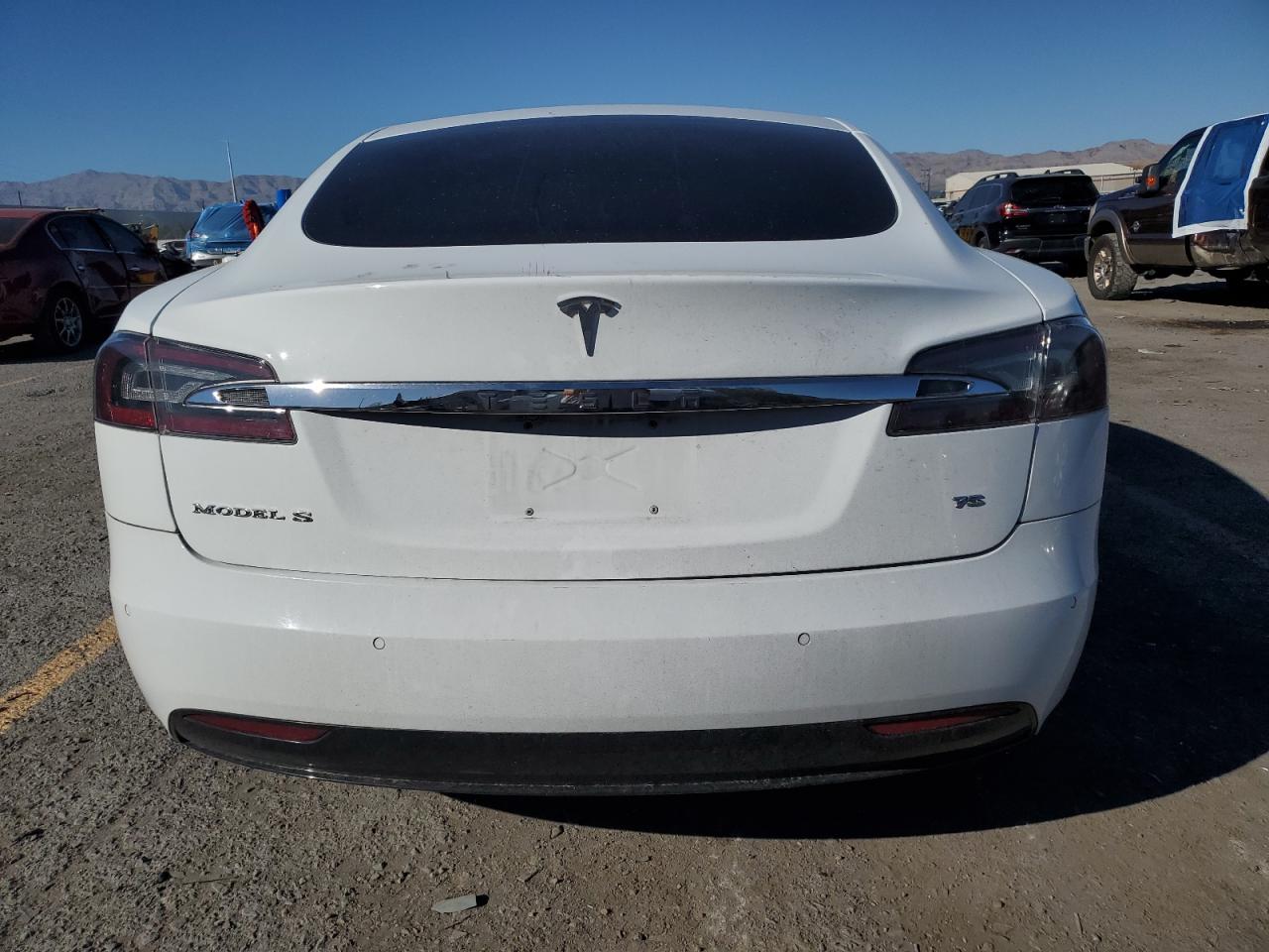 2016 Tesla Model S VIN: 5YJSA1E10GF148383 Lot: 85385005