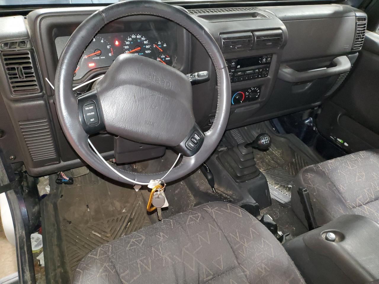 2002 Jeep Wrangler / Tj Sport VIN: 1J4FA49S02P731924 Lot: 81682445