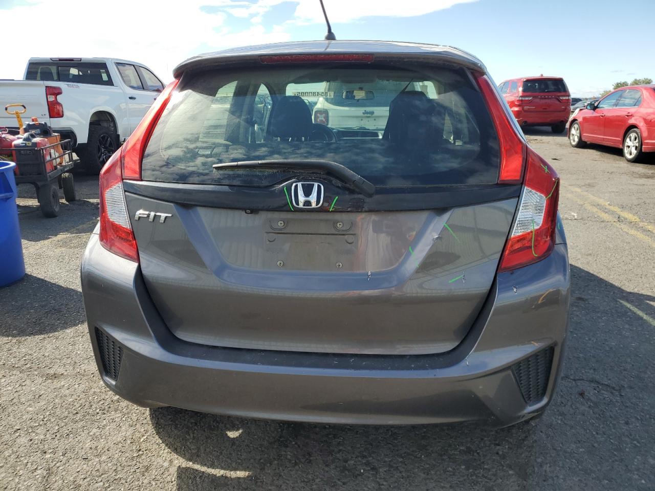2016 Honda Fit Lx VIN: JHMGK5H55GS001860 Lot: 85480005