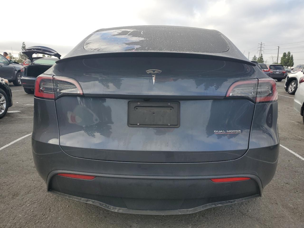 2023 Tesla Model Y VIN: 7SAYGDEF7PF958571 Lot: 84988605