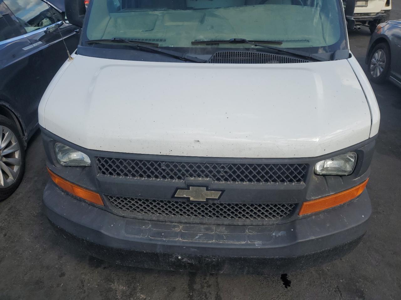 2012 Chevrolet Express G1500 VIN: 1GCSGAFXXC1102869 Lot: 82216625