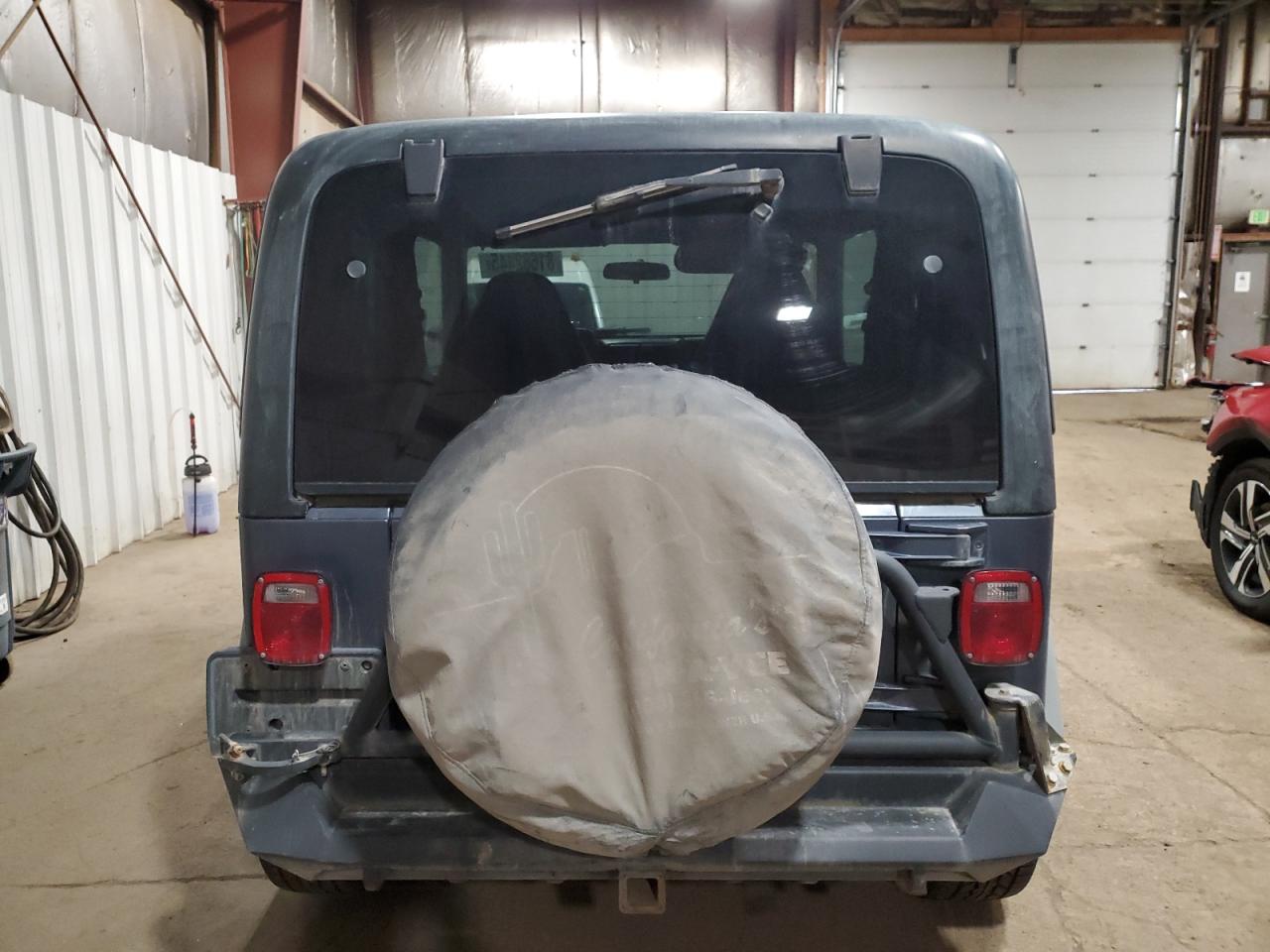 2002 Jeep Wrangler / Tj Sport VIN: 1J4FA49S02P731924 Lot: 81682445
