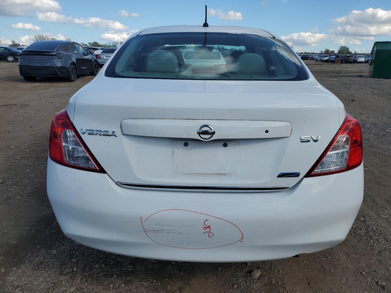 2012 Nissan Versa S VIN: 3N1CN7AP7CL884791 Lot: 82302965
